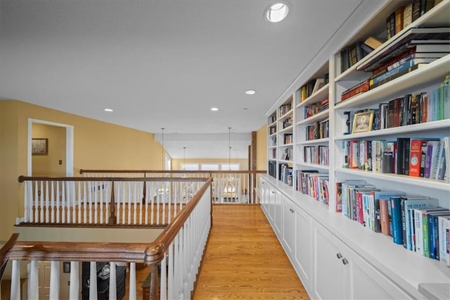 hallway featuring recessed lighting and light wood-style floors