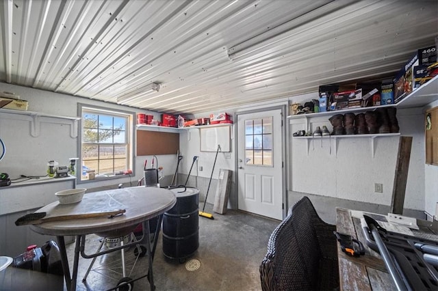 dining room featuring concrete flooring