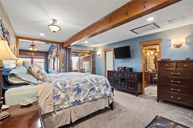 carpeted bedroom featuring access to exterior, visible vents, and beam ceiling