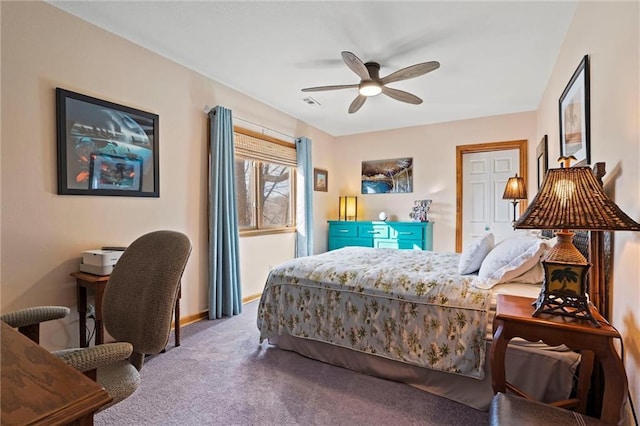 carpeted bedroom with ceiling fan, visible vents, and baseboards