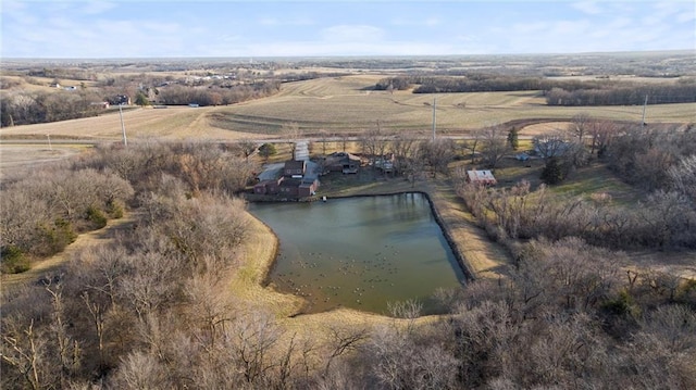 aerial view with a water view and a rural view