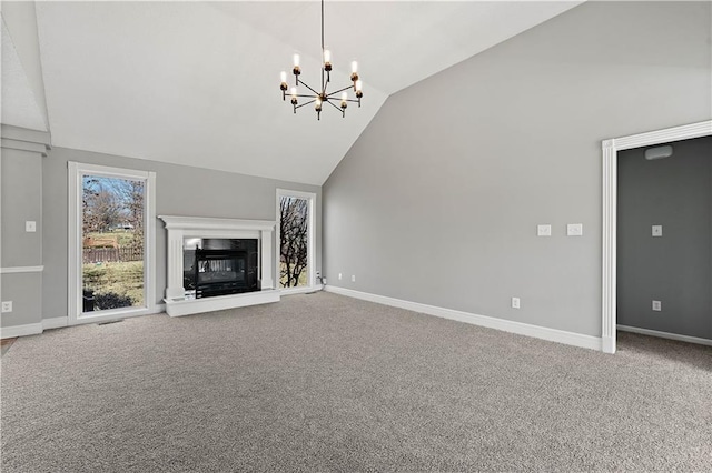 unfurnished living room featuring carpet flooring, a fireplace, and baseboards