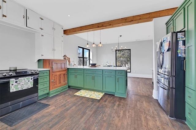 kitchen with beam ceiling, green cabinets, appliances with stainless steel finishes, white cabinetry, and a peninsula