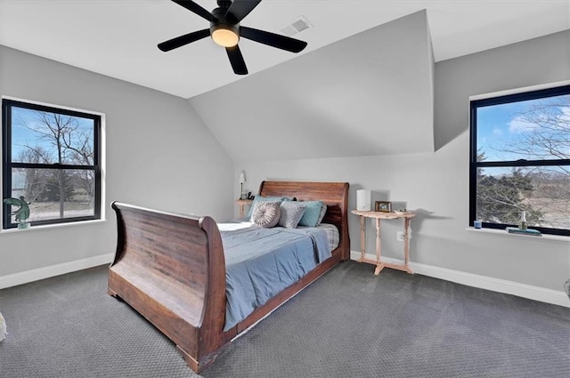 bedroom with dark colored carpet, visible vents, a ceiling fan, vaulted ceiling, and baseboards