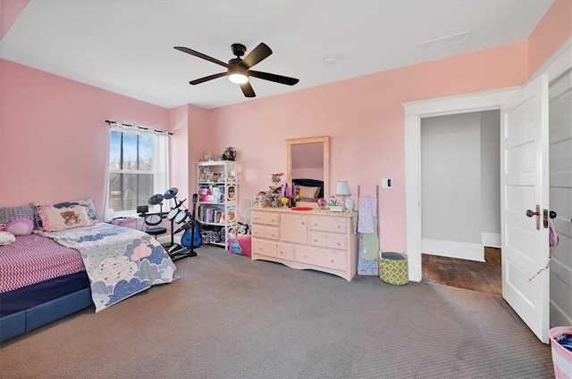 bedroom with ceiling fan and carpet