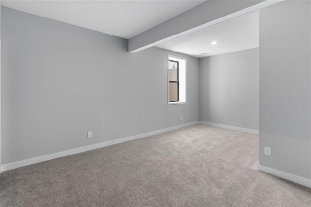 unfurnished room featuring carpet floors, baseboards, and recessed lighting