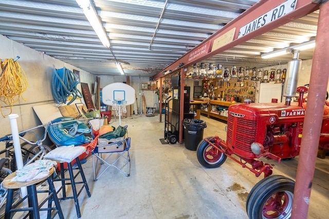 garage with a workshop area