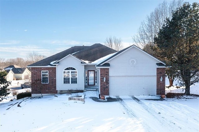 ranch-style home with brick siding and an attached garage