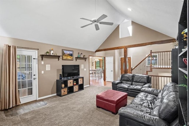 carpeted living room featuring stairs, high vaulted ceiling, a ceiling fan, and baseboards