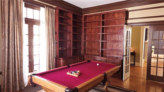 recreation room with french doors, billiards, and wood finished floors