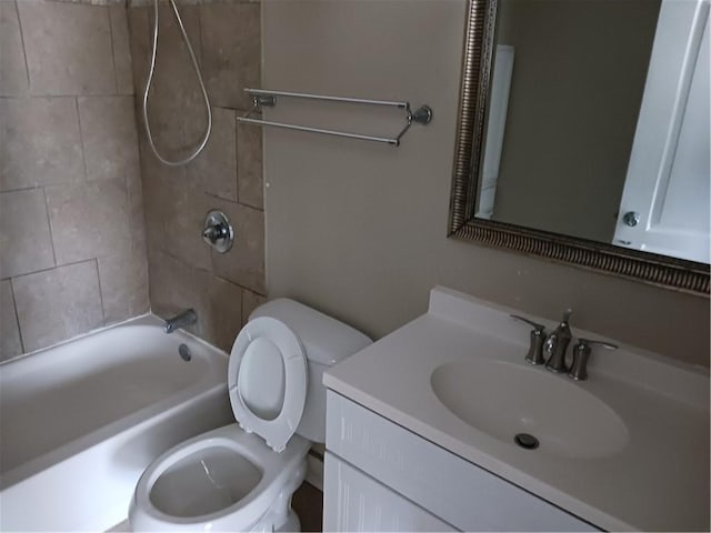 full bathroom with shower / bathtub combination, vanity, and toilet