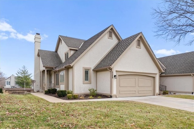 view of front of home featuring concrete driveway, a front lawn, a garage, and stucco siding