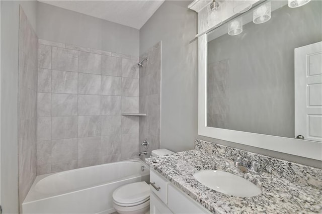 bathroom with shower / washtub combination, vanity, and toilet