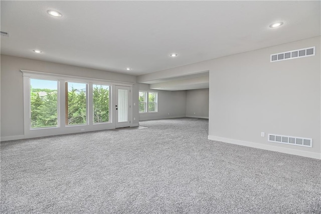 2850 W Wabash St, Olathe, KS 66061 - carpeted empty room featuring baseboards and recessed lighting