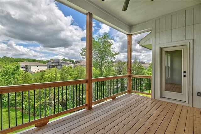 2850 W Wabash St, Olathe, KS 66061 - wooden terrace featuring ceiling fan and a residential view