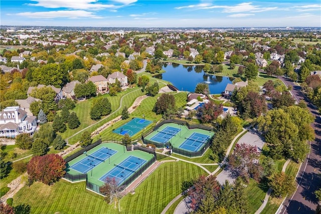 bird's eye view featuring a water view and a residential view