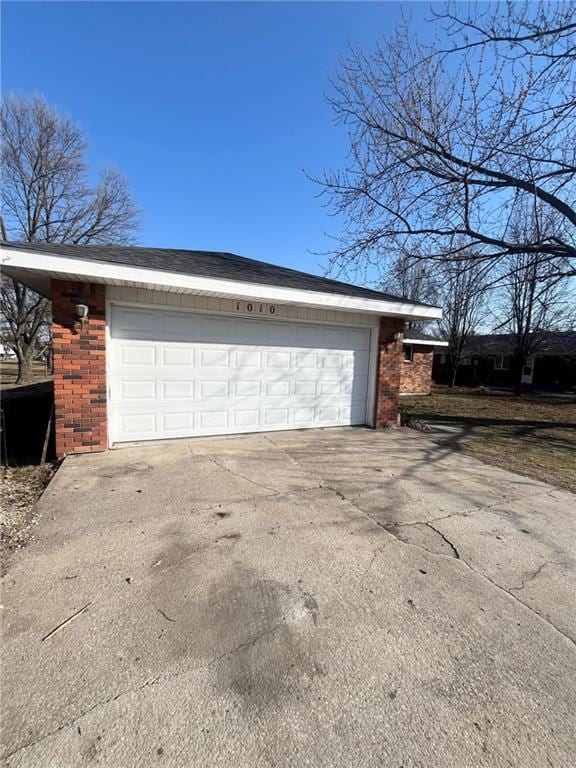 garage with driveway