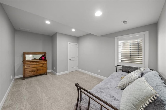 bedroom featuring recessed lighting, visible vents, light carpet, and baseboards