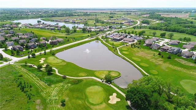 bird's eye view featuring view of golf course, a water view, and a residential view