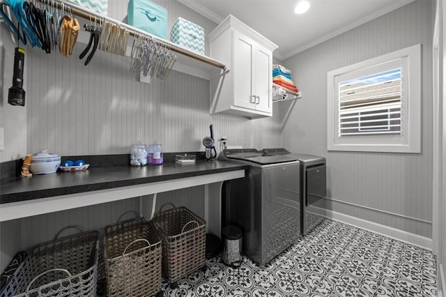 14423 N 145th St, Basehor, KS 66007 - clothes washing area with crown molding, washer and clothes dryer, cabinet space, and baseboards