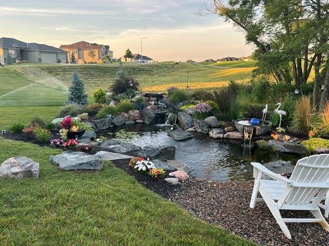 14423 N 145th St, Basehor, KS 66007 - view of yard featuring a small pond