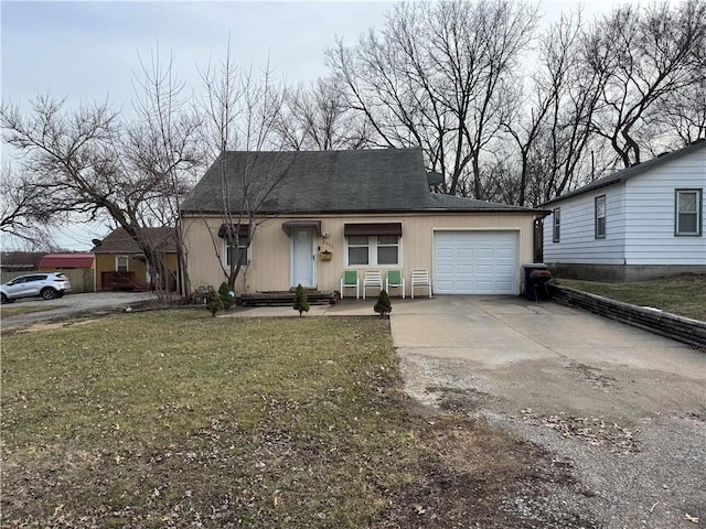 view of front of house with concrete driveway, an attached garage, and a front yard