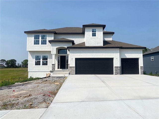 9100 NE 98th Ter, Kansas City, MO 64157 - view of front of house with an attached garage, driveway, stucco siding, and stone siding