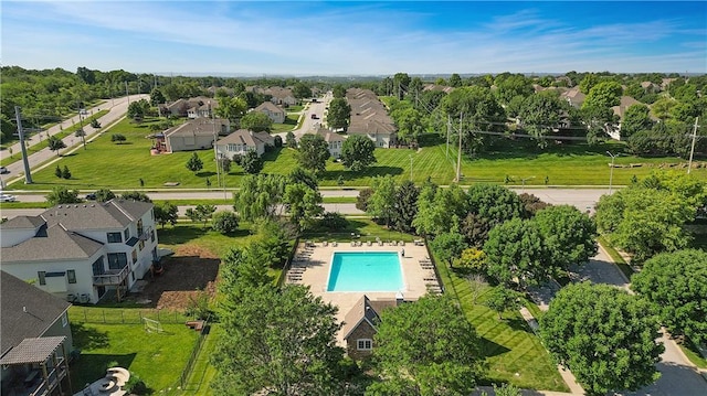 9100 NE 98th Ter, Kansas City, MO 64157 - aerial perspective of suburban area with a pool area