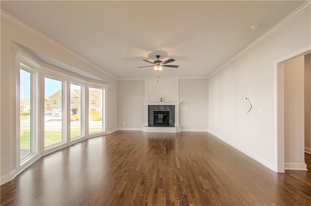 9100 NE 98th Ter, Kansas City, MO 64157 - unfurnished living room with plenty of natural light, dark wood-style flooring, ceiling fan, and ornamental molding