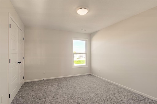 9100 NE 98th Ter, Kansas City, MO 64157 - carpeted empty room featuring baseboards