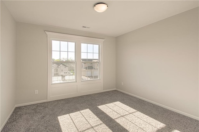 9100 NE 98th Ter, Kansas City, MO 64157 - spare room featuring carpet