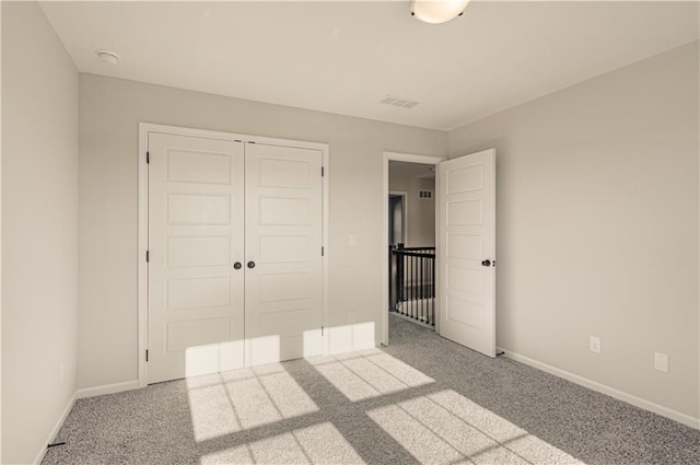 9100 NE 98th Ter, Kansas City, MO 64157 - unfurnished bedroom featuring carpet flooring and a closet