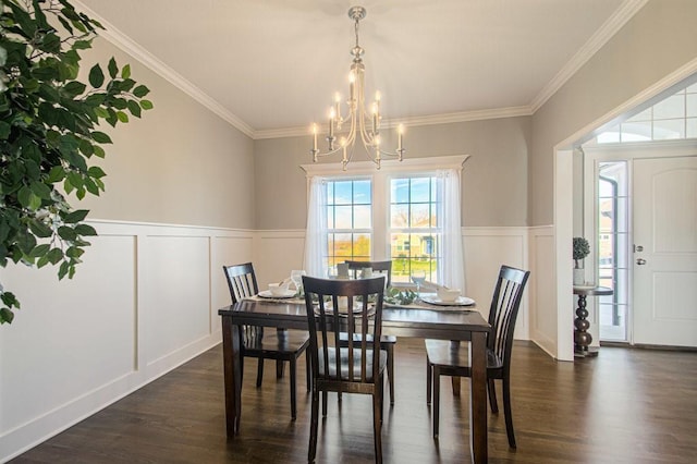 9100 NE 98th Ter, Kansas City, MO 64157 - dining room featuring a chandelier, a decorative wall, dark wood-type flooring, a wainscoted wall, and ornamental molding