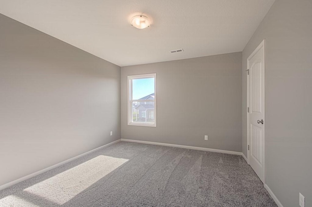 9100 NE 98th Ter, Kansas City, MO 64157 - empty room with carpet flooring and baseboards