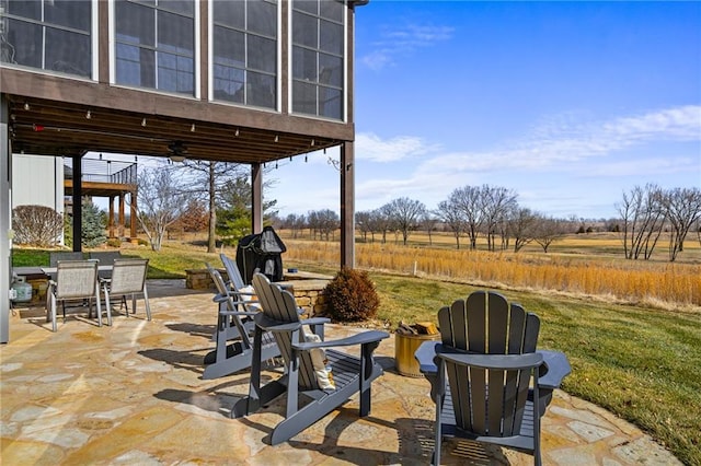 view of patio featuring outdoor dining area