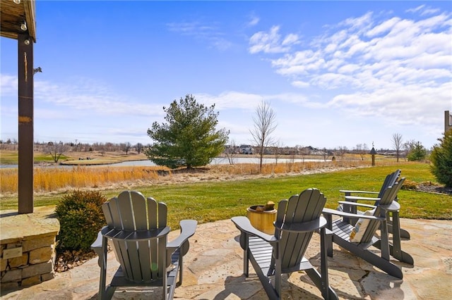 view of patio / terrace with a water view