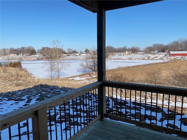 view of snow covered deck