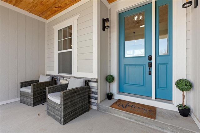 property entrance with covered porch