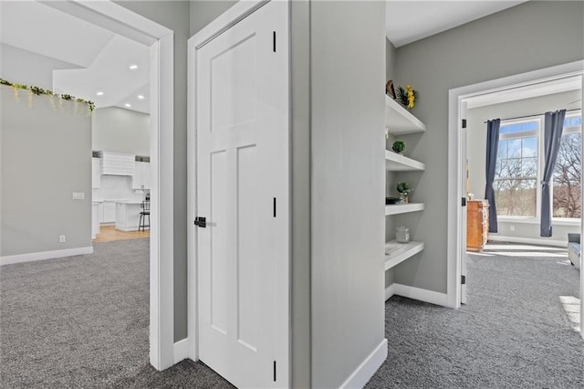 corridor with recessed lighting, carpet, and baseboards