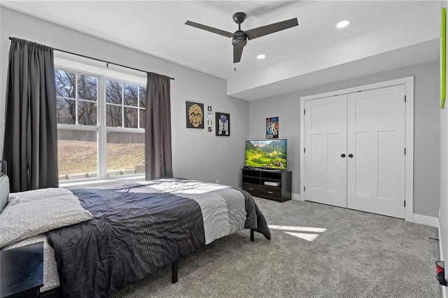 bedroom featuring recessed lighting, a closet, carpet, baseboards, and ceiling fan