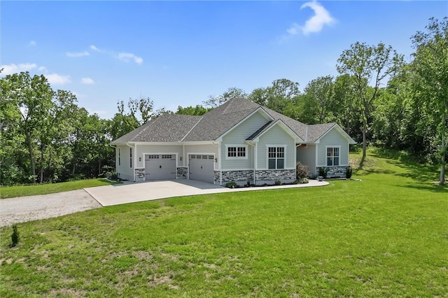13723 Raliegh Ln, Holt, MO 64048 - craftsman-style home featuring a garage, driveway, a front yard, stone siding, and a shingled roof