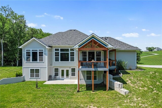 13723 Raliegh Ln, Holt, MO 64048 - rear view of house with a patio, a lawn, a deck, and french doors