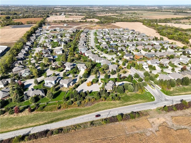 birds eye view of property with a residential view