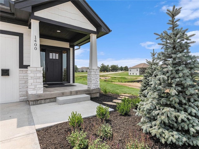 15619 Sheridan Ct, Basehor, KS 66007 - entrance to property with covered porch and stone siding