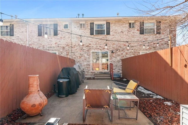 view of patio featuring a fenced backyard