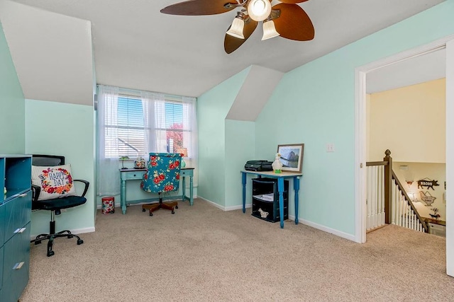 home office featuring vaulted ceiling, carpet, and baseboards