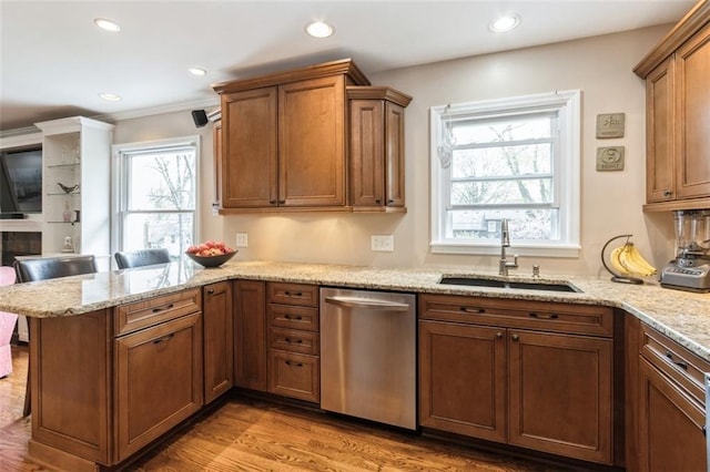 7345 Booth St, Prairie Village, KS 66208 - kitchen featuring dishwasher, brown cabinets, a peninsula, and a sink