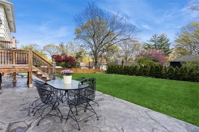 7345 Booth St, Prairie Village, KS 66208 - view of patio / terrace featuring outdoor dining area, stairway, and fence