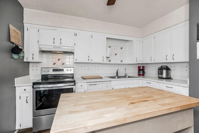 kitchen featuring white cabinetry, white dishwasher, a sink, stainless steel range with electric stovetop, and under cabinet range hood