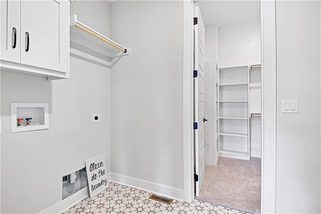 15026 W 129th Ter, Olathe, KS 66062 - laundry room with cabinet space, hookup for a washing machine, hookup for an electric dryer, and light floors